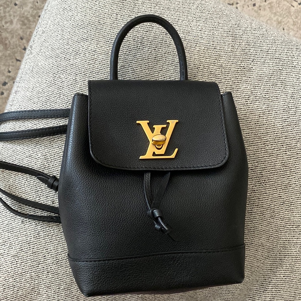 Louis Vuitton Black Leather Petite Backpack with Gold Logo